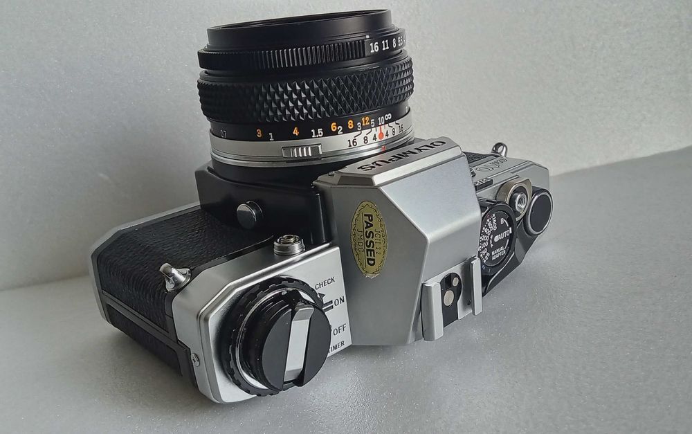 Плівковий фотапарат Olympus OM-10 50mm 1.8