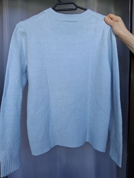 Camisola de malha azul claro da Mo Woman