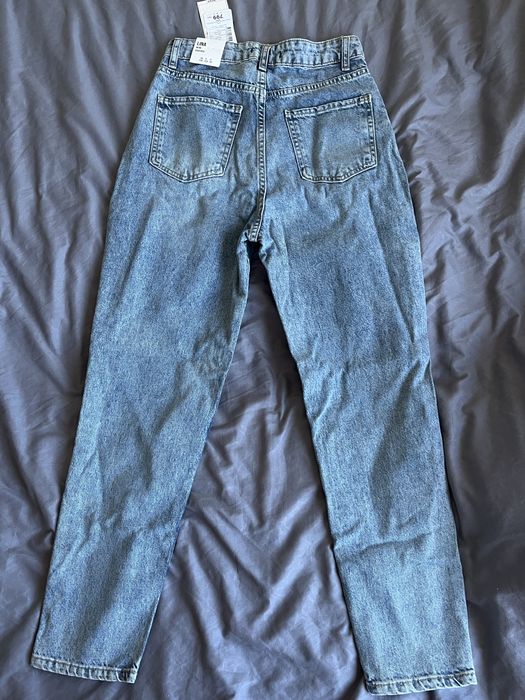 Джинси Mom, Рвані джинси