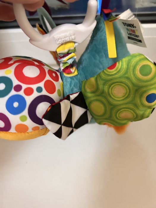 Іграшка на коляску