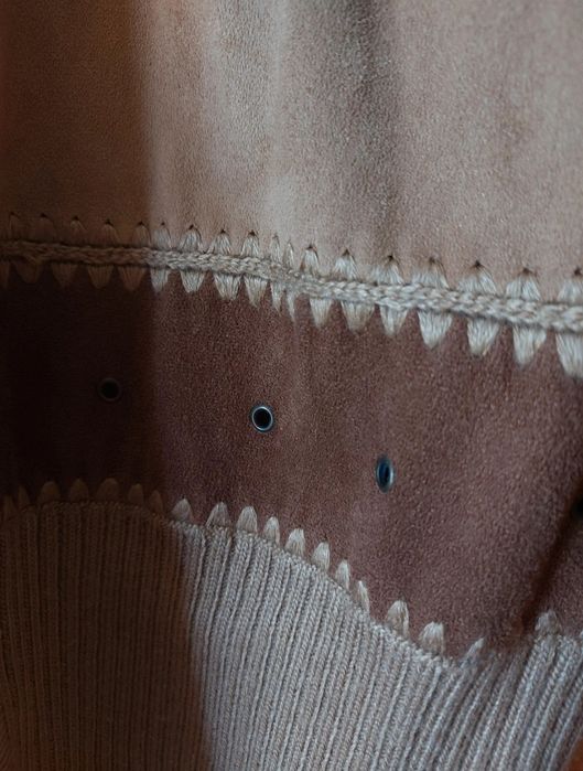 Casaco em tons de castanho