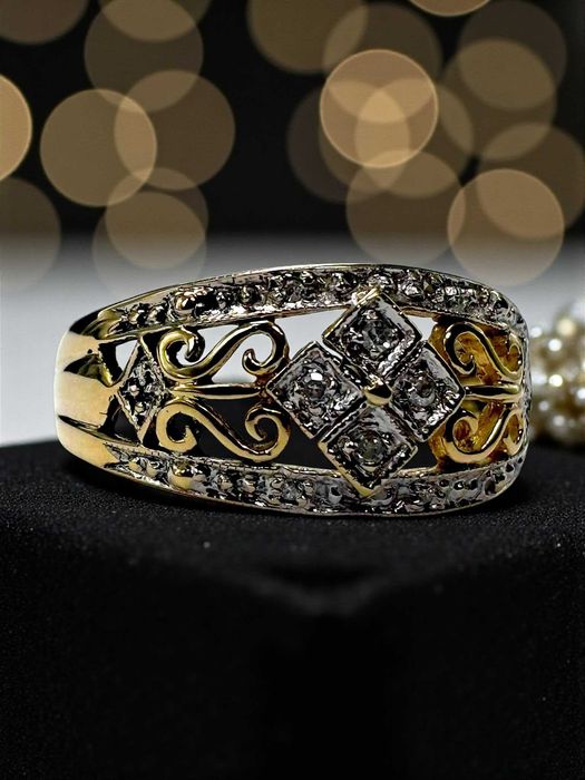 Pierścionek z czterema Brylantami p.585/w.3,46 g