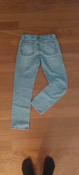 Calças jeans azuis claras