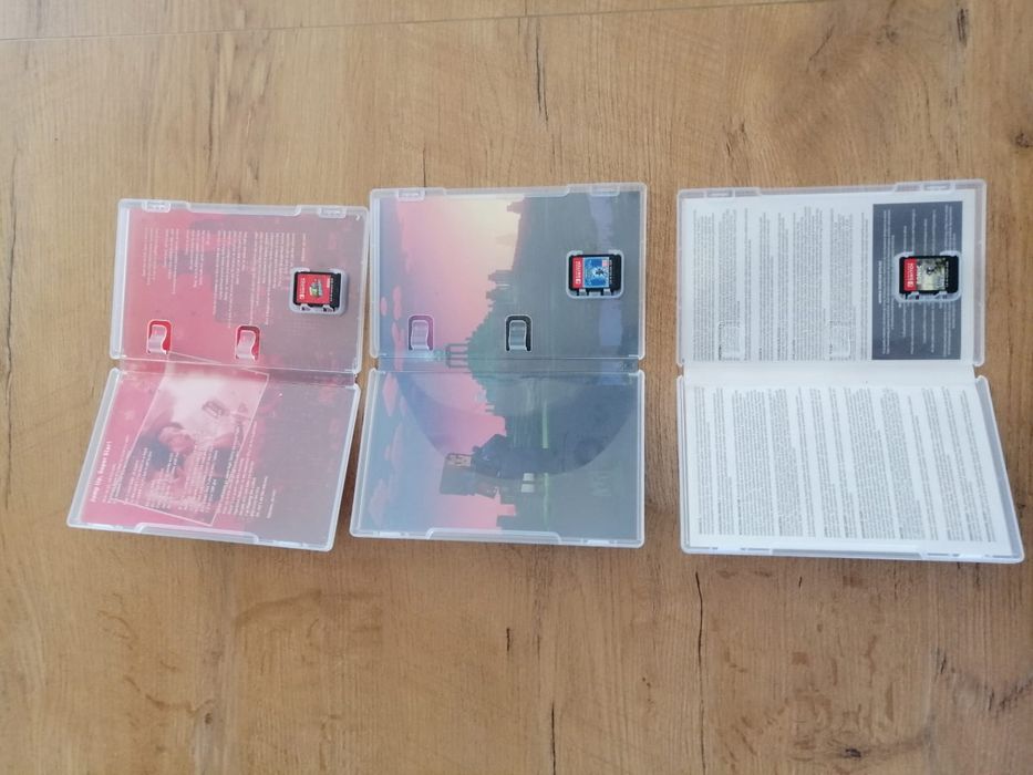 Nintendo Switch OLED + 4 gry