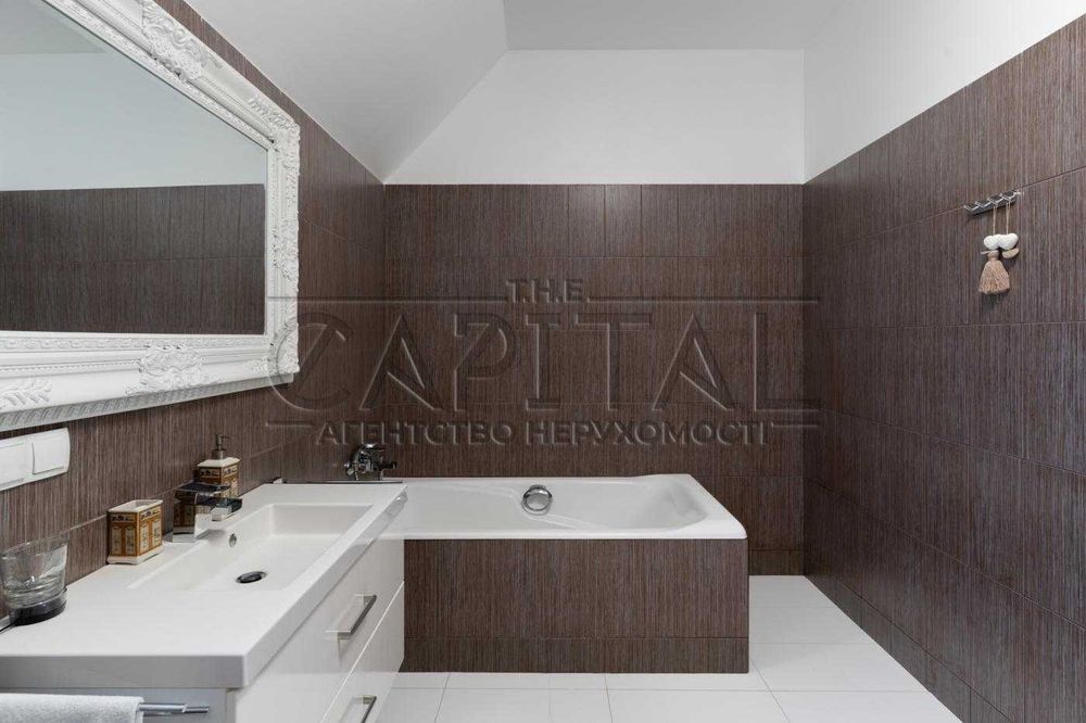 Продаж сучасного будинку 280 м² з підвалом 80 м² на ділянці 12 соток у Вишеньках