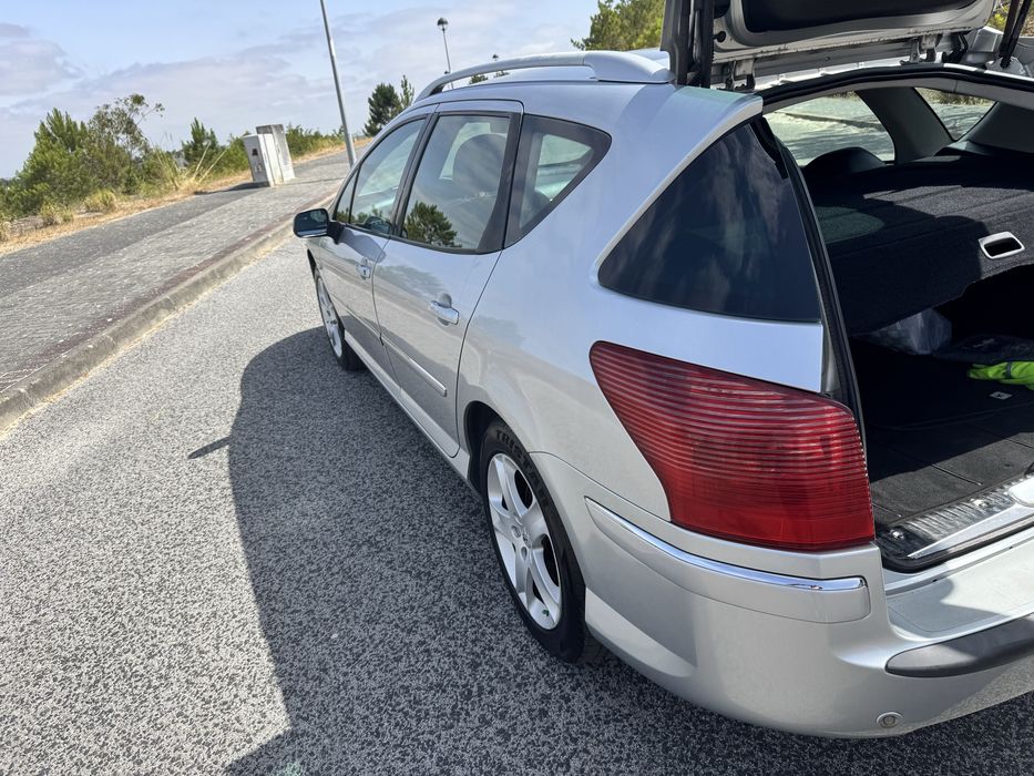 Peugeot 407 SW 2.0 HDi, de junho de 2006,
