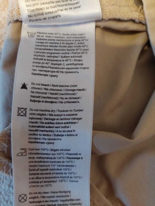 Spodnie beżowe damskie.