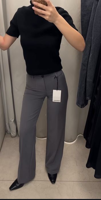 Продаж класичних штанів BERSHKA