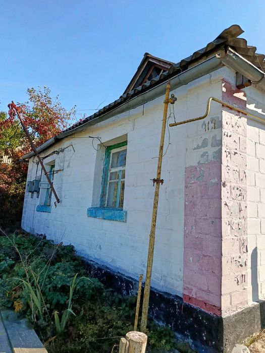 Продам територію з будинком