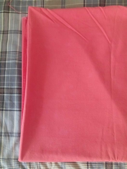 Tecido em cor de laranja/ salmão