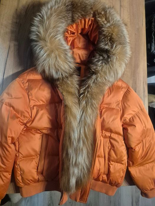 Куртки, пуховікі жіночі