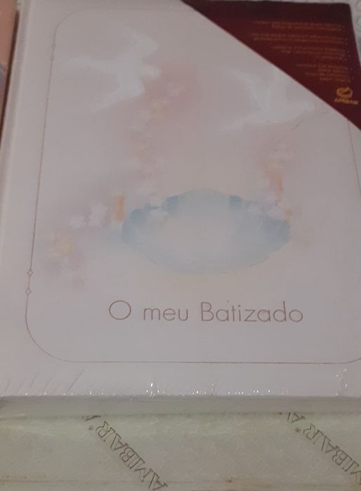Álbuns de fotos novos em caixa