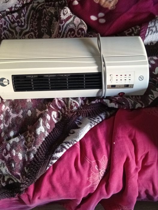 1aquecedor de parede com comando