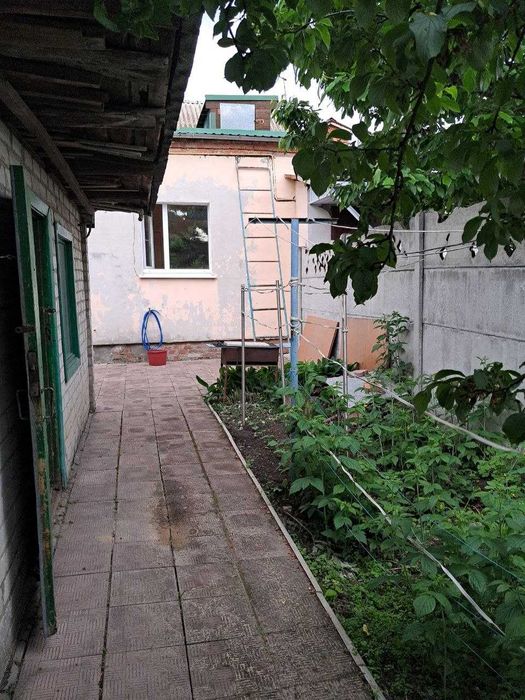 Продам 1/2 дома на Салтовке в районе парка Победы.