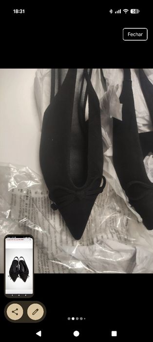 Sapatos rasos novos com etiqueta