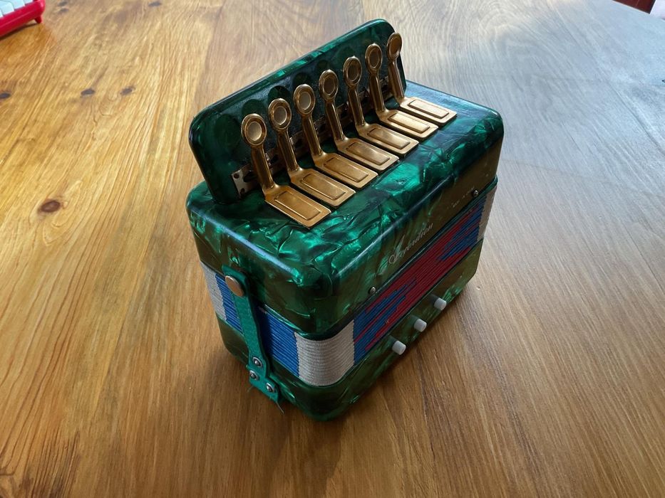 Mini acordion portátil