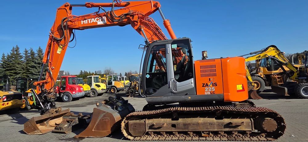 Hitachi <<Hitachi ZX225USLC-3 ROTO z 2022 roku na podwójnym złączu 3łyżki+widły!>>  << Hitachi ZX225,Roto! 3 łyżki widły, z Niemiec!>>