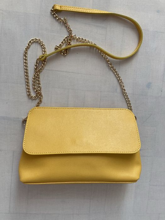 Żólta torebka kopertówka skórzana