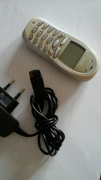 Telemóveis Siemens e Nokia e F1 e suporte magnético telemóvel