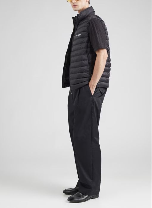 Пухова безрукавка Armani Exchange колір чорний XM001576 AF16927