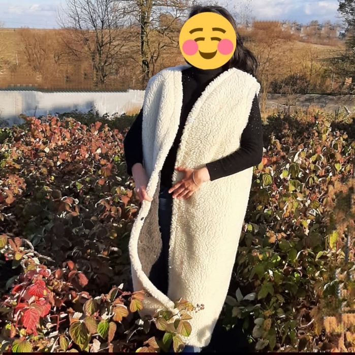 Теплий довгий двошаровий жилет нижче коліна з овчини