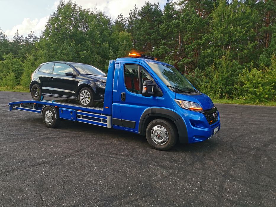 Pomoc Drogowa Laweta Holowanie Transport  Aut maszyn rolniczych