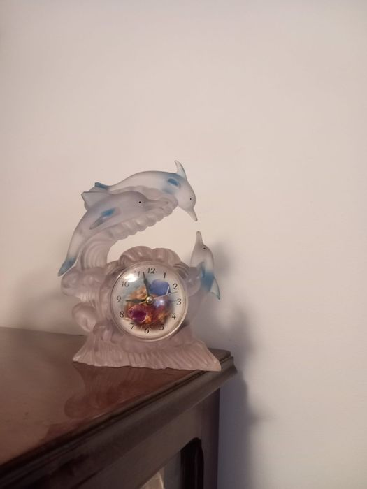 Relógio de golfinho
