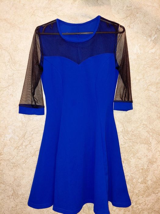 Блакитна, глубока сукня. Підійте на будь-який святковий вечір