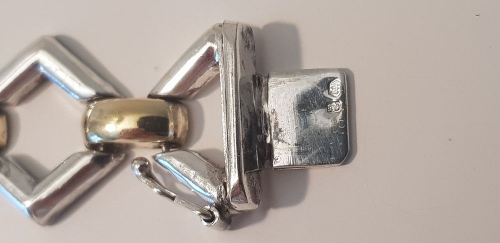 Pulseira semi rígida Prata e Ouro