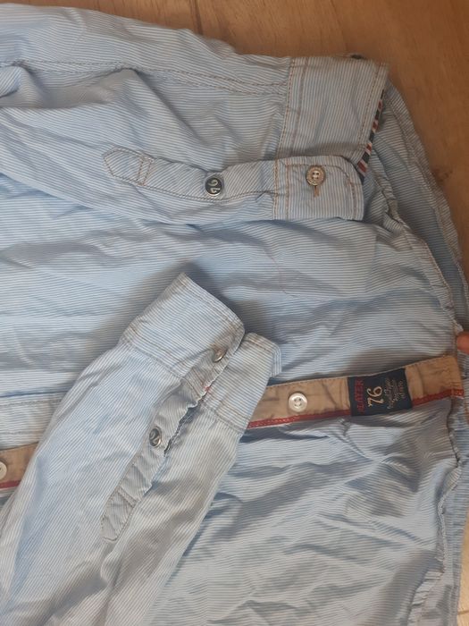 2 koszule błękitne paski 152 oraz 158