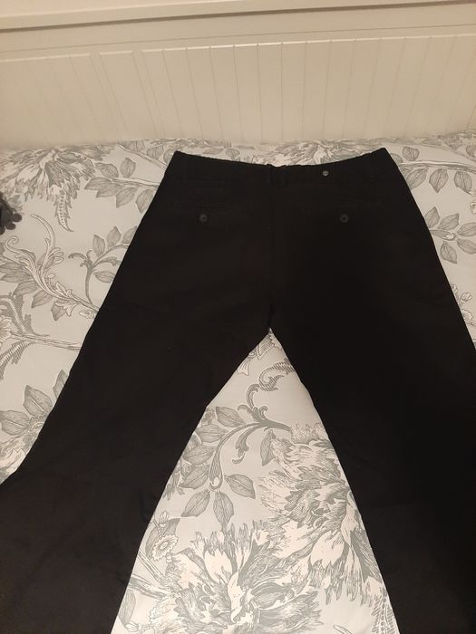 Calças de homem pretas