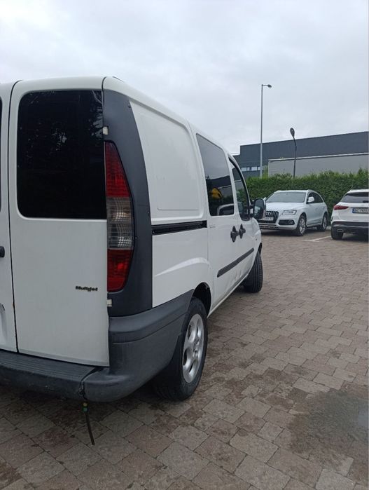 Машина Fiat Doblo