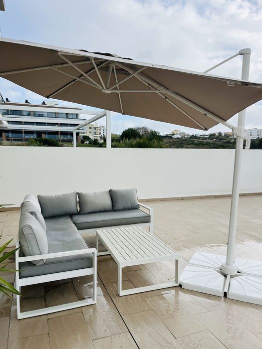 Conjunto jardim com guarda sol