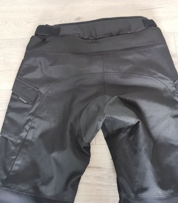 Calças para motociclista impermeáveis