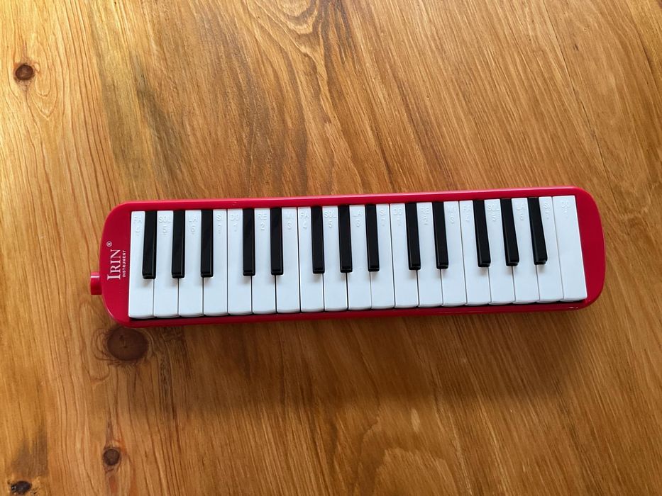 Mini piano portátil