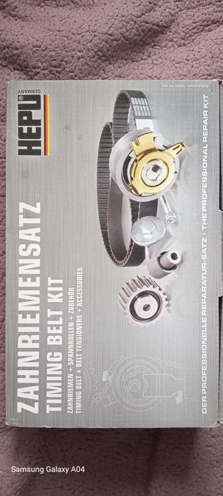 Продам комплект ремень грм з натяжним роликом ,та помпу