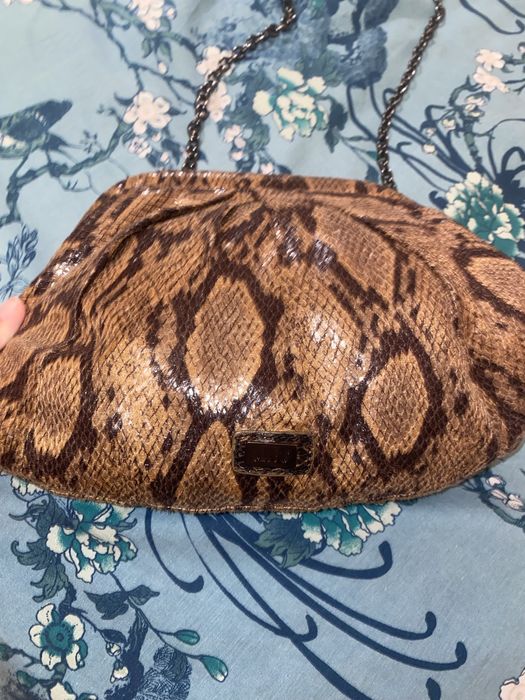 Mala tiracolo de pele