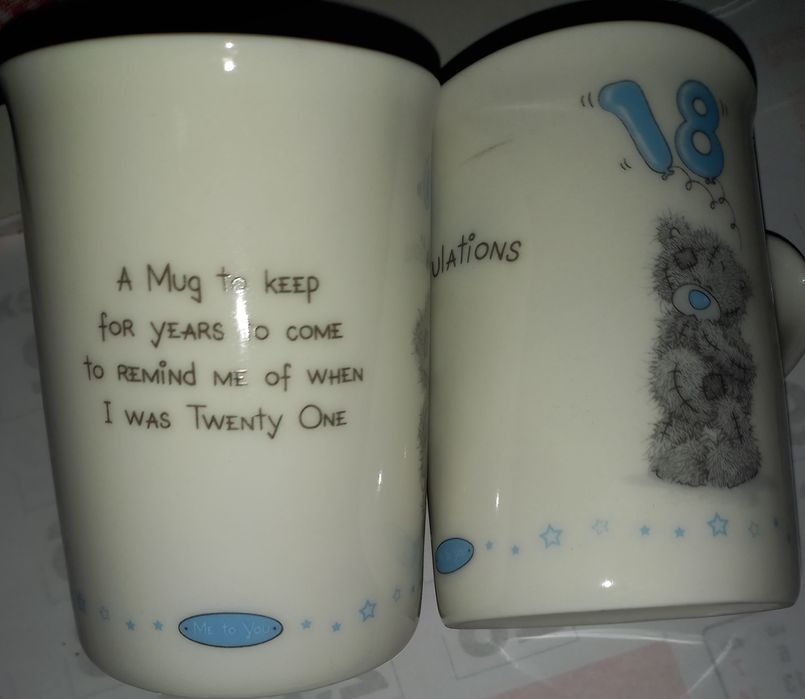 2 ceramic mugs.423596768143626242