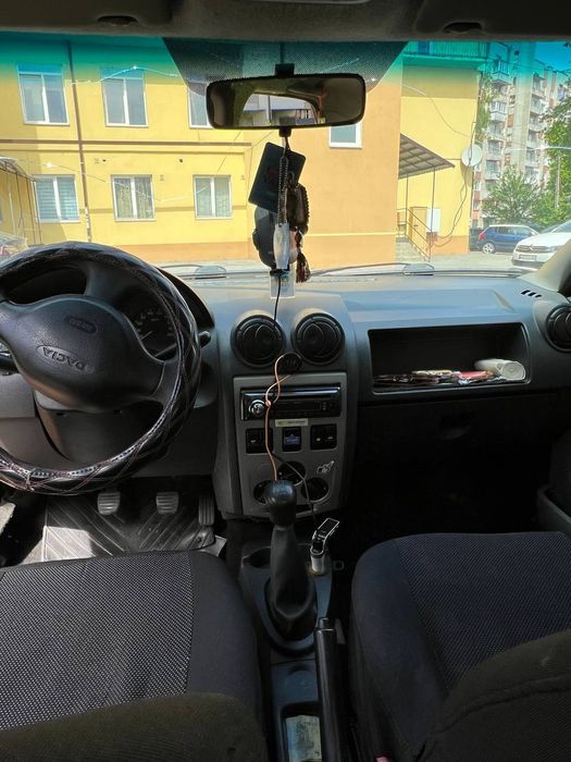 Лоґан1,4 газ бензин