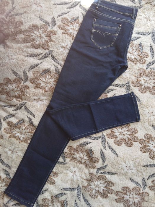 Джинси, штани жіночі
