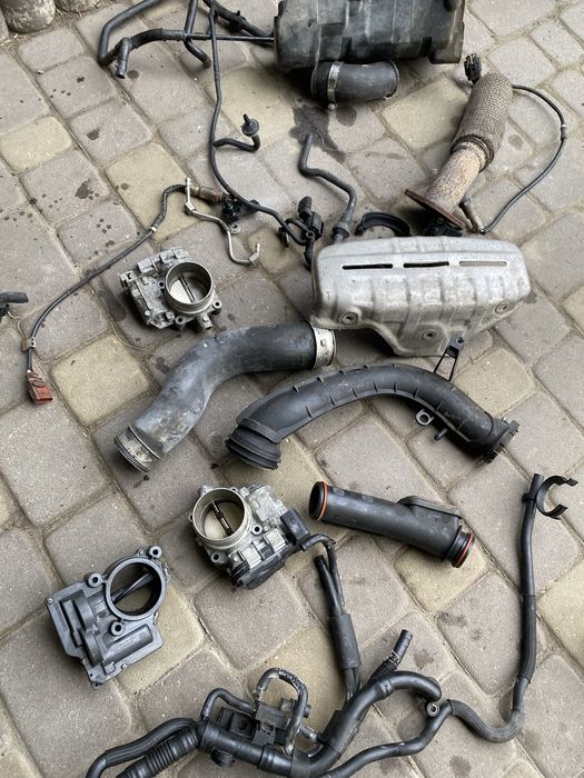 03C276 - Компрессор 1.4 TSI Golf VI  Заслонка 03C128063A