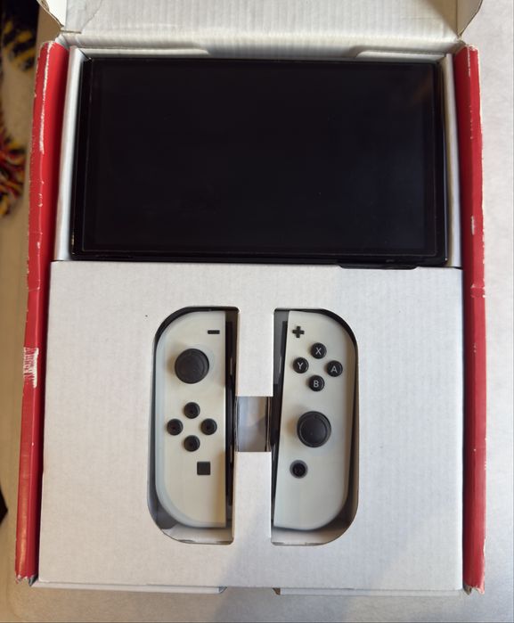 Nintendo Switch OLED completa + extras