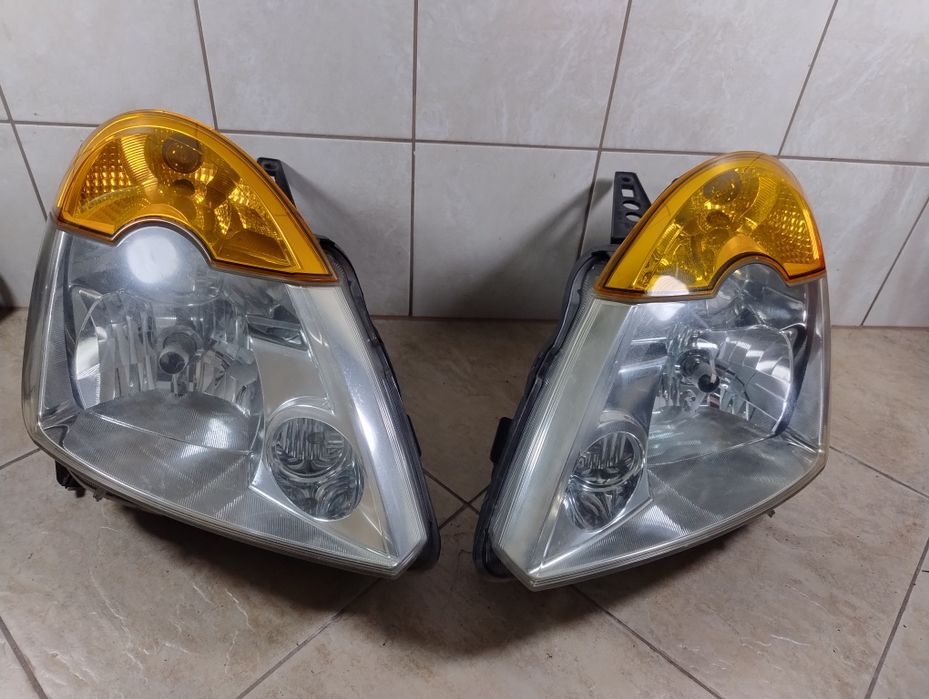 Lampa reflektor prawy lewy komplet Renault Modus wysyłka kierunkowskaz