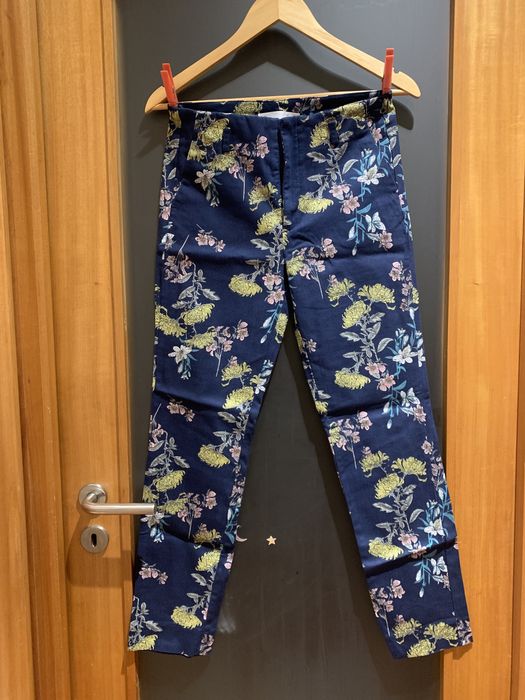 Calças de pano com motivos florais