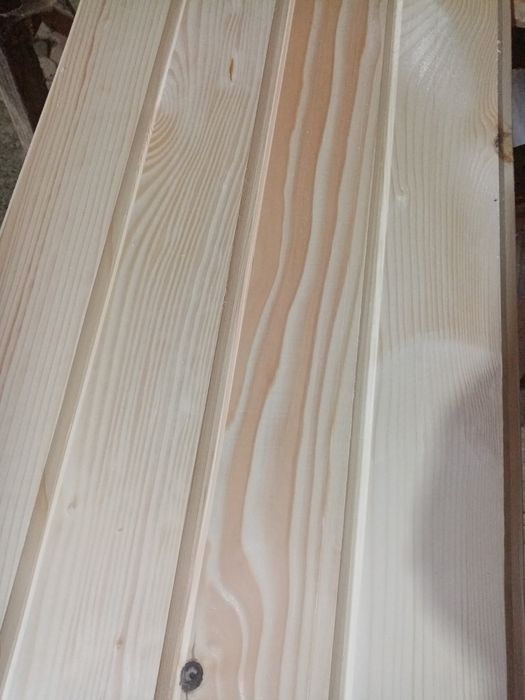 Дерев'яна підлога, імітація бруса та дерев'яна вагонка. Є: "ОПТ"