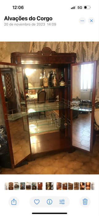 Garrafeira italiana com luz no interior e toda espelhada