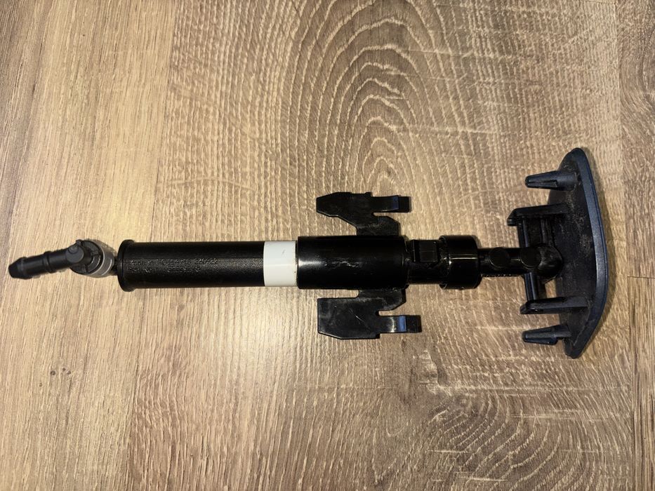 Форсунка омивача фари з кришкою передня ліва Volvo XC40 /32229278