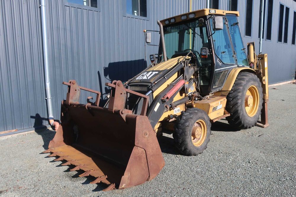 koparko ładowarka caterpillar 438D 4x4
