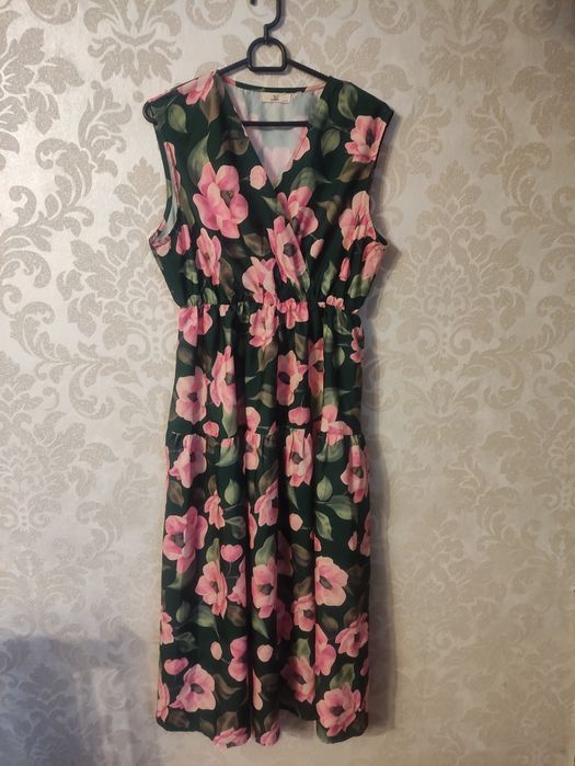 Letnia rozkloszowana sukienka MIDI zielona w kwiaty
