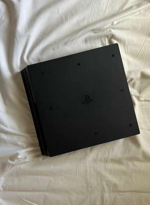PS4 Pro 1TB com caixa